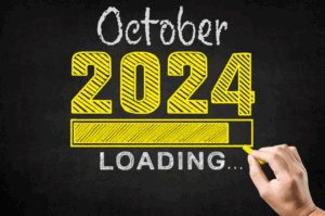 chalkboard that says October 2024 loading
