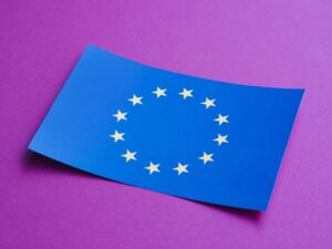 European union flag sitting on purple background
