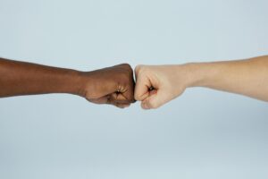 Close Up Fist Bump With Copy Space