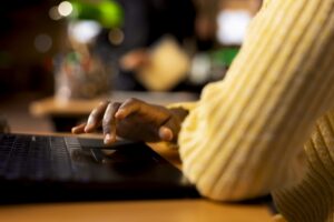 Preteen Student Working On A School Assignment In The Library