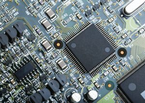 Closeup Of Electronic Circuit Board With Cpu Microchip Electronic Components Background