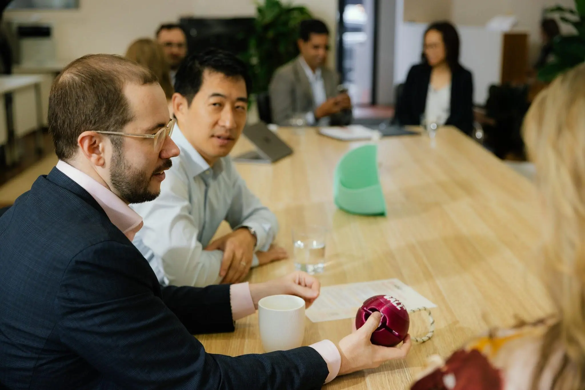 Australian intellectual property attorneys discussing intellectual property rights and protection strategies in a meeting.